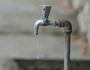 Corpus Christi Council Ends Inner Harbor desalination plans as dripping faucet highlights city’s urgent need for water solutions.