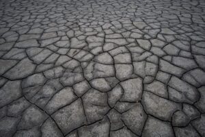 Cracked dry ground symbolizes the Corpus Christi water crisis as severe drought strains the region’s water supply.