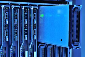 Blue-lit server racks and storage drives illustrate the high-capacity AI computing planned for the Nueces County data center.