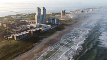 Corpus Christi coastline with beachfront hotels highlighting Corpus Christi tourism awards and the Coastal Bend hospitality industry