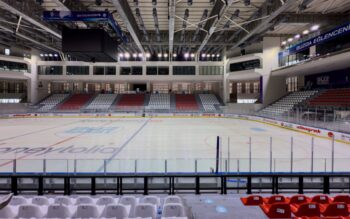Ice hockey arena interior with empty rink and stands, highlighting the setting for Marcel Braithwaite Pittsburgh Penguins.